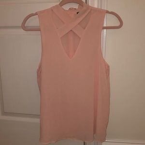 light pink criss cross blouse